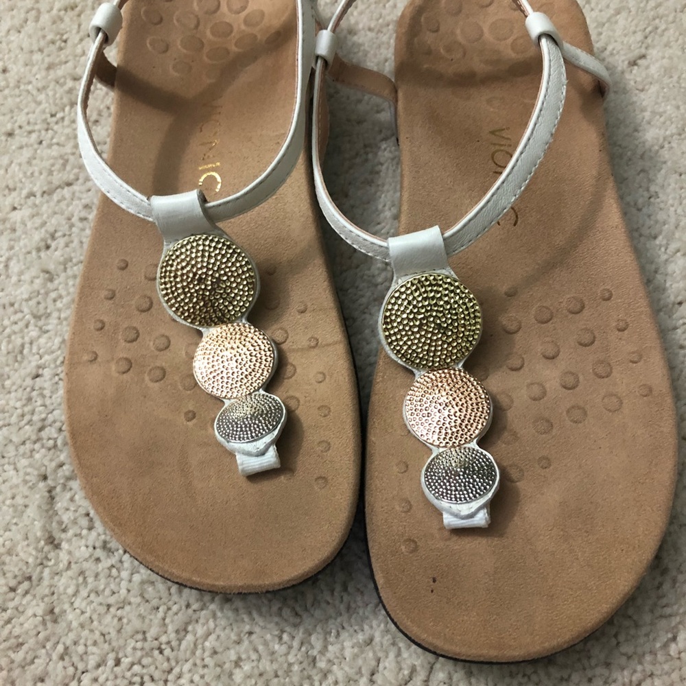 White Vionic sandals with silver, copper & gold